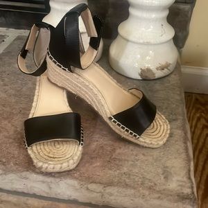 Black ankle strap leather espadrille sandals.